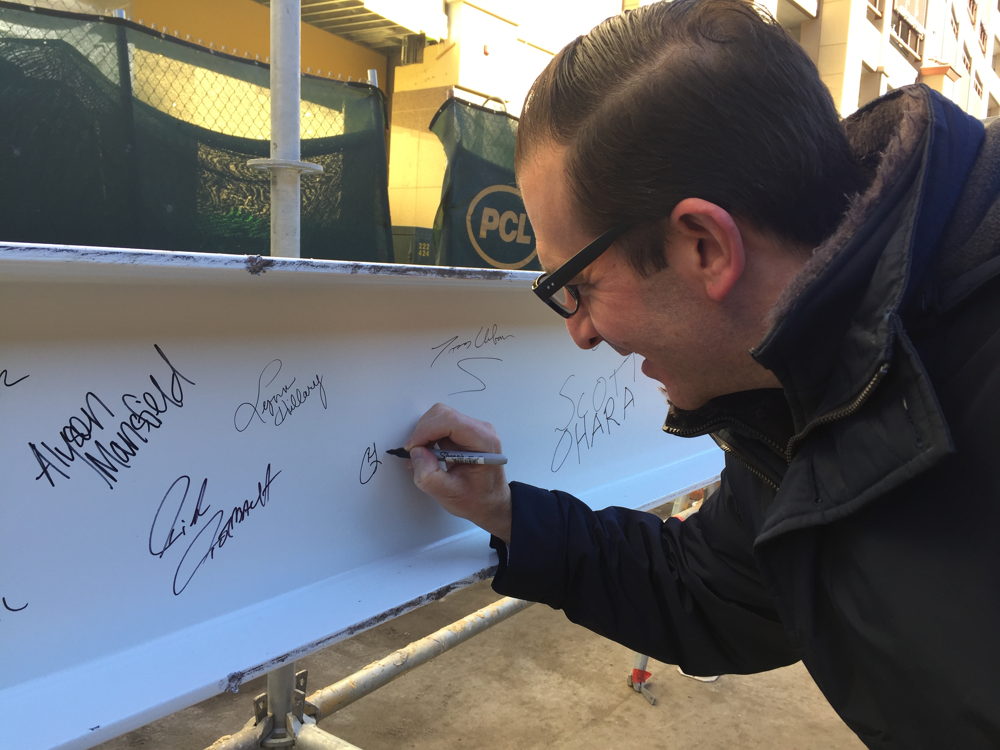 Monarch Casino Black Hawk general manager Craig Pleva signs the beam. 