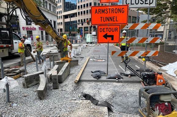 New sidewalk recently placed at Fifth Avenue and Market Street