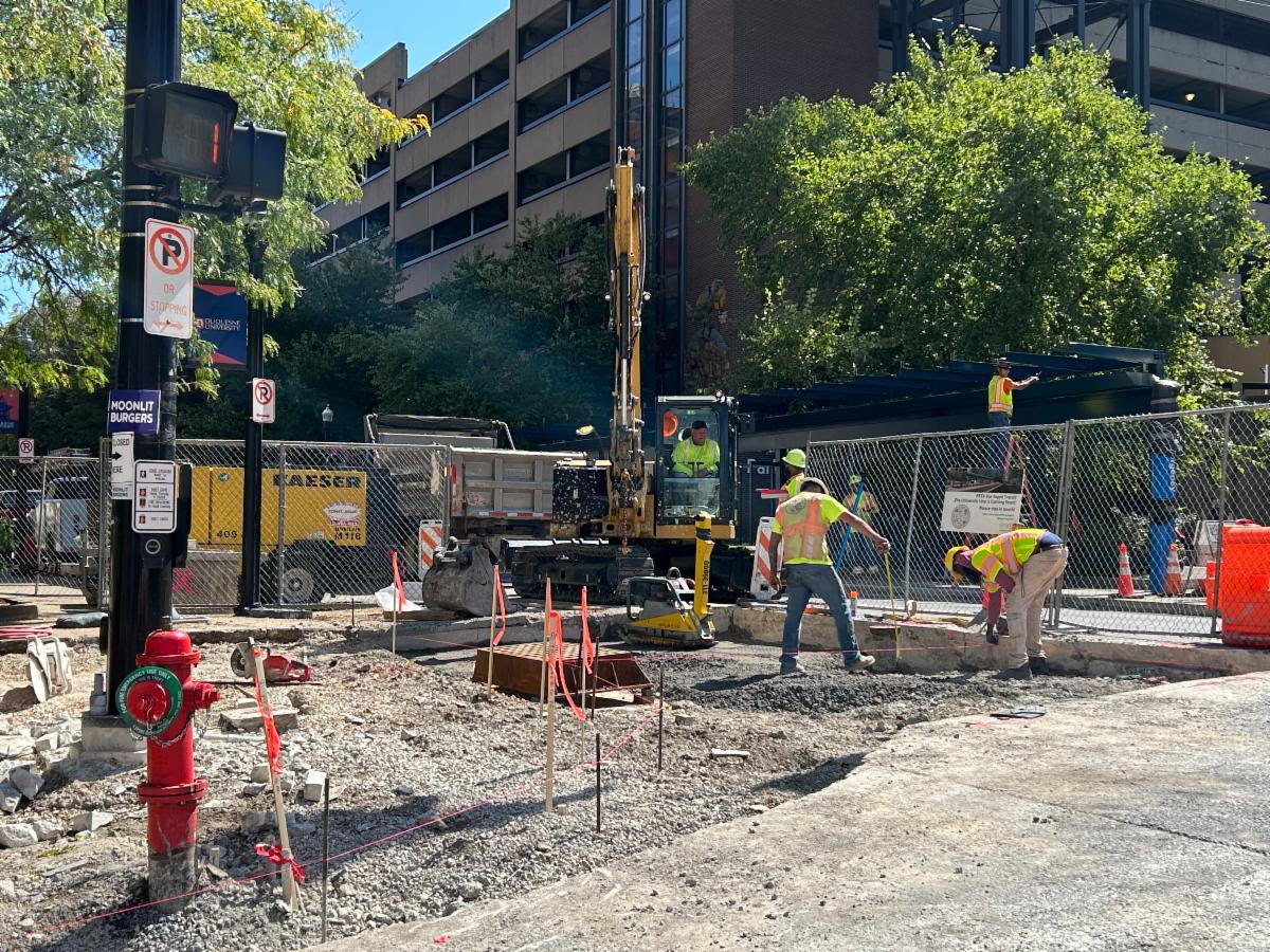 Sidewalk construction on the corner of Forbes Avenue and Chatham Square Sidewalk construction on the corner of Forbes Avenue and Chatham Square