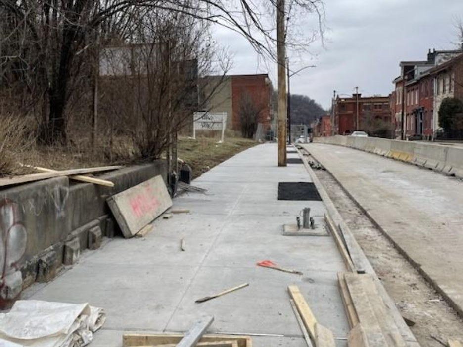 New sidewalk recently installed on Fifth Avenue from Dinwiddie Street to Watson Street