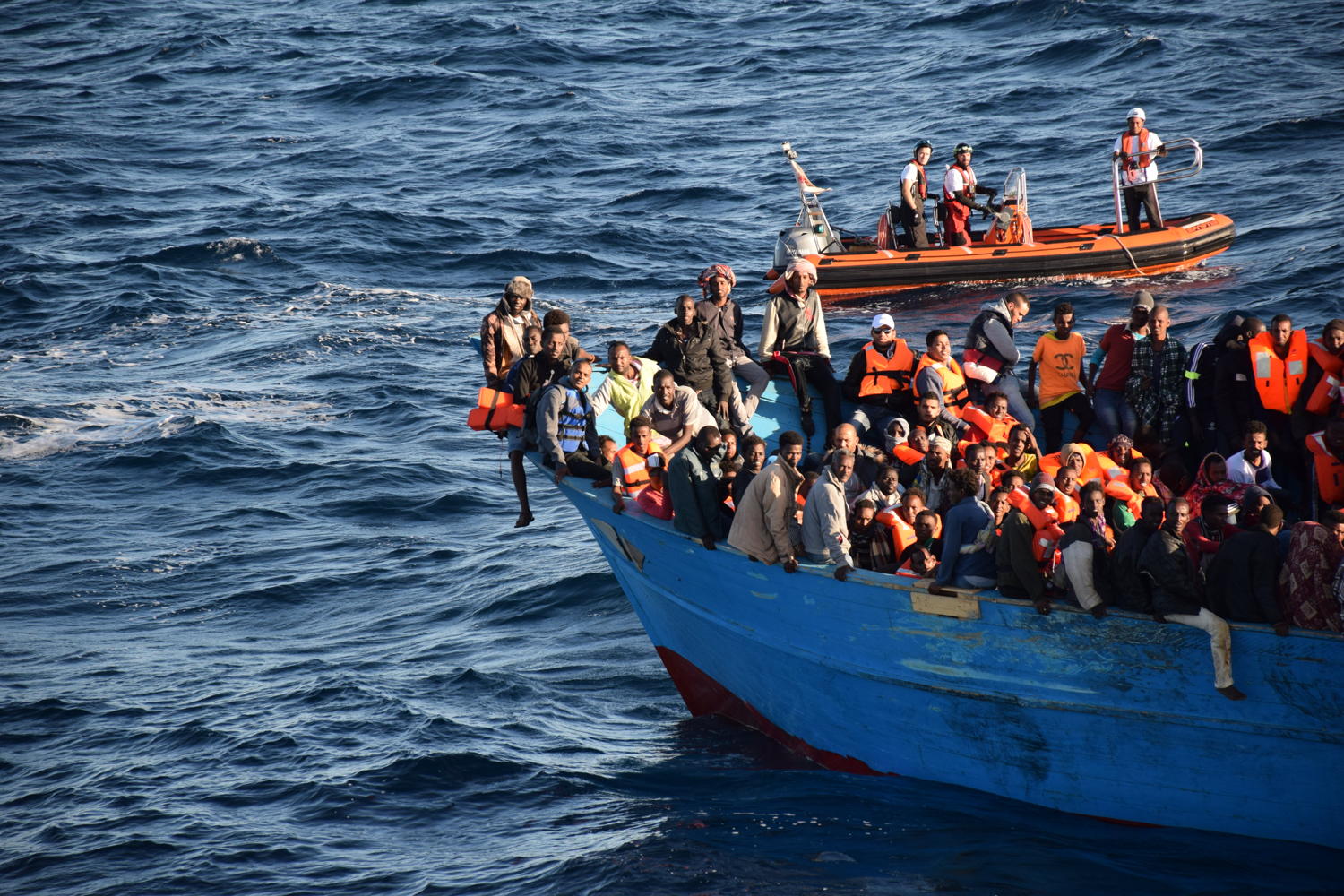 Bourbon Argos and Aquarius crew and Medecins Sans Frontieres (MSF) staff rescue 700 people aboard an overcrowded wooden boat in the Central Mediterranean Sea.  © Maria Carla Giugliano/MSF