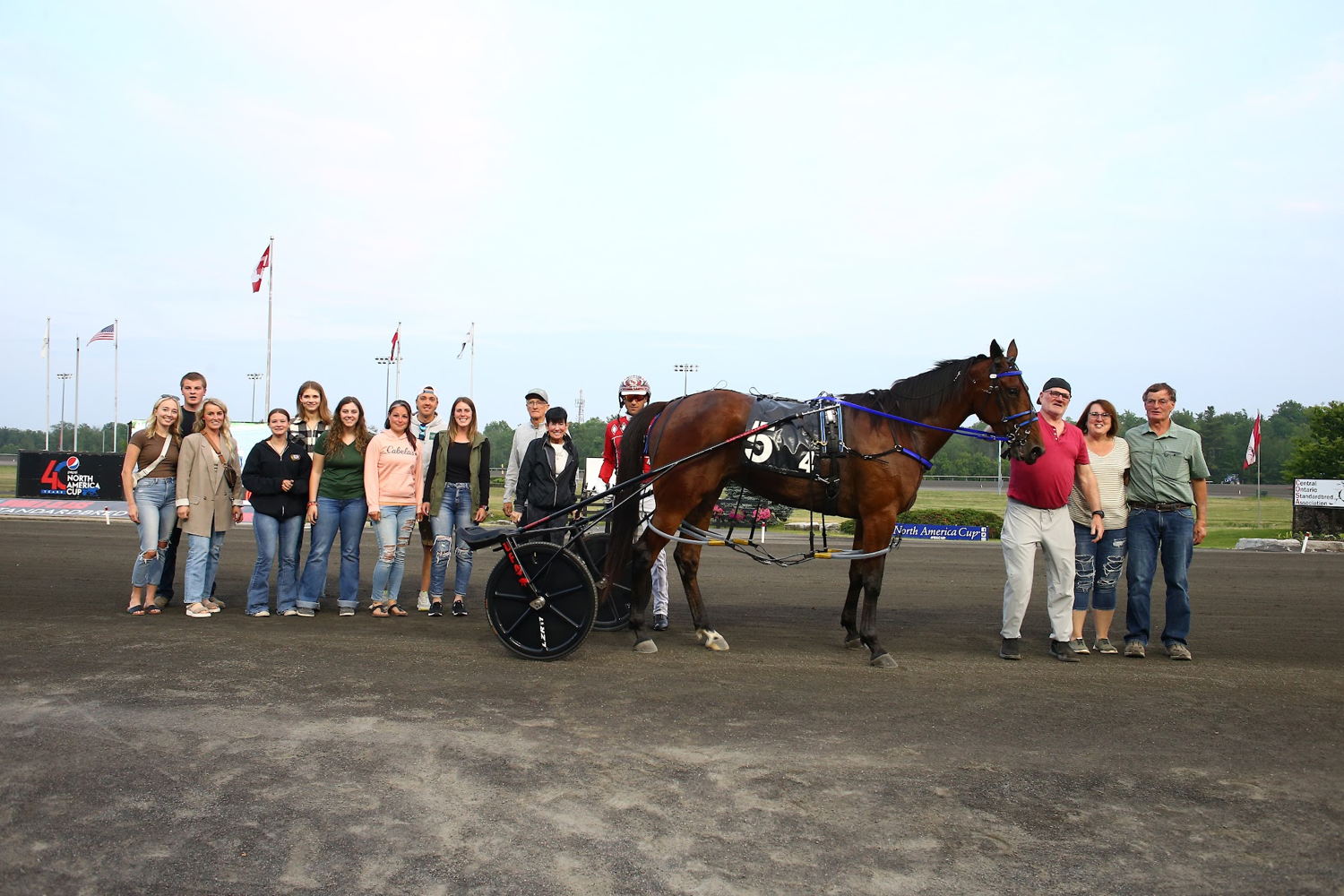 Twin B Joe Fresh and connections in the winner's circle for the first Fan Hanover elimination on June 10, 2023 at Woodbine Mohawk Park (New Image Media)