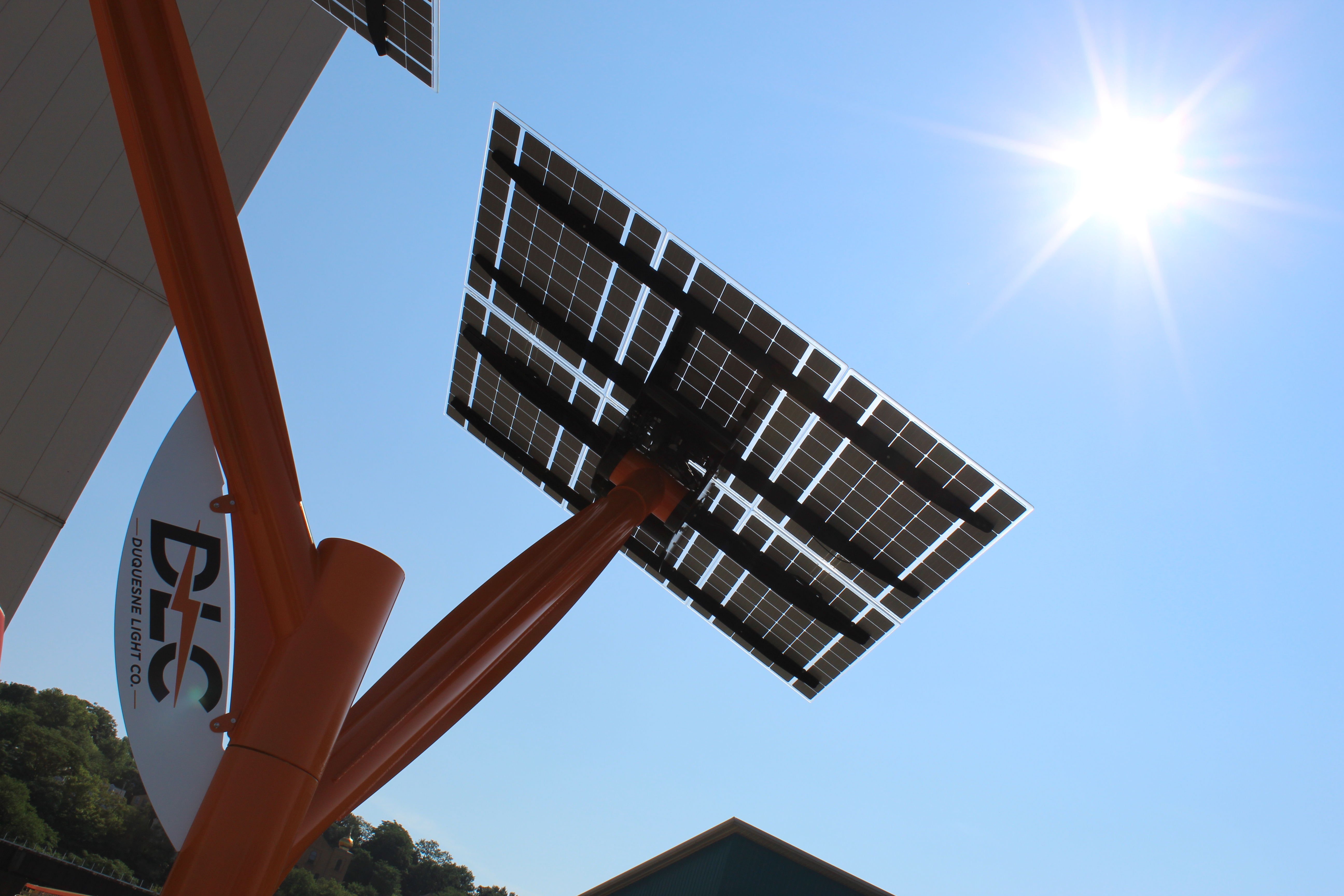 On a bright, cloudless day, the solar panels atop the tree harness plenty of sunlight to produce clean energy.