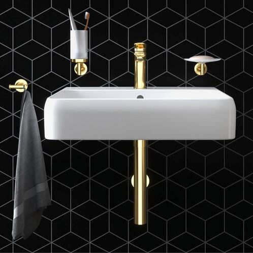 De Qatego-spoelbak krijgt een upgrade met gouden accessoires die dienen als elegante opberger voor handdoeken, zeep en tandenborstels.