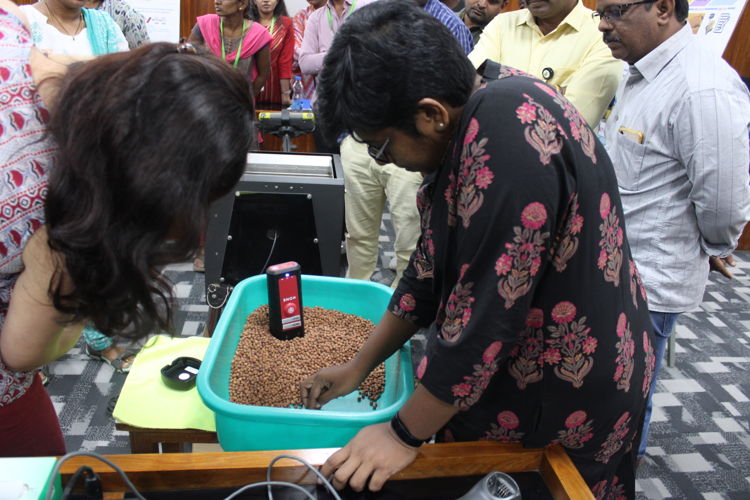 Operating portable NIR instrument for rapid assessment of chickpea grain quality.