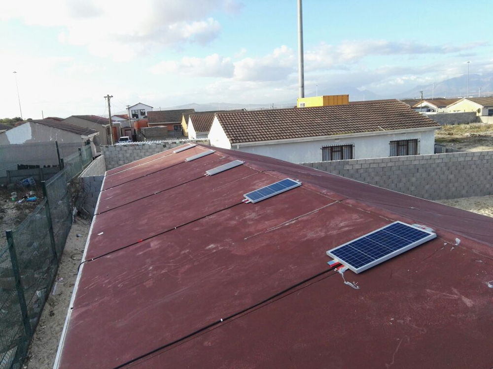 After a long day the solar panels are mounted on the roof