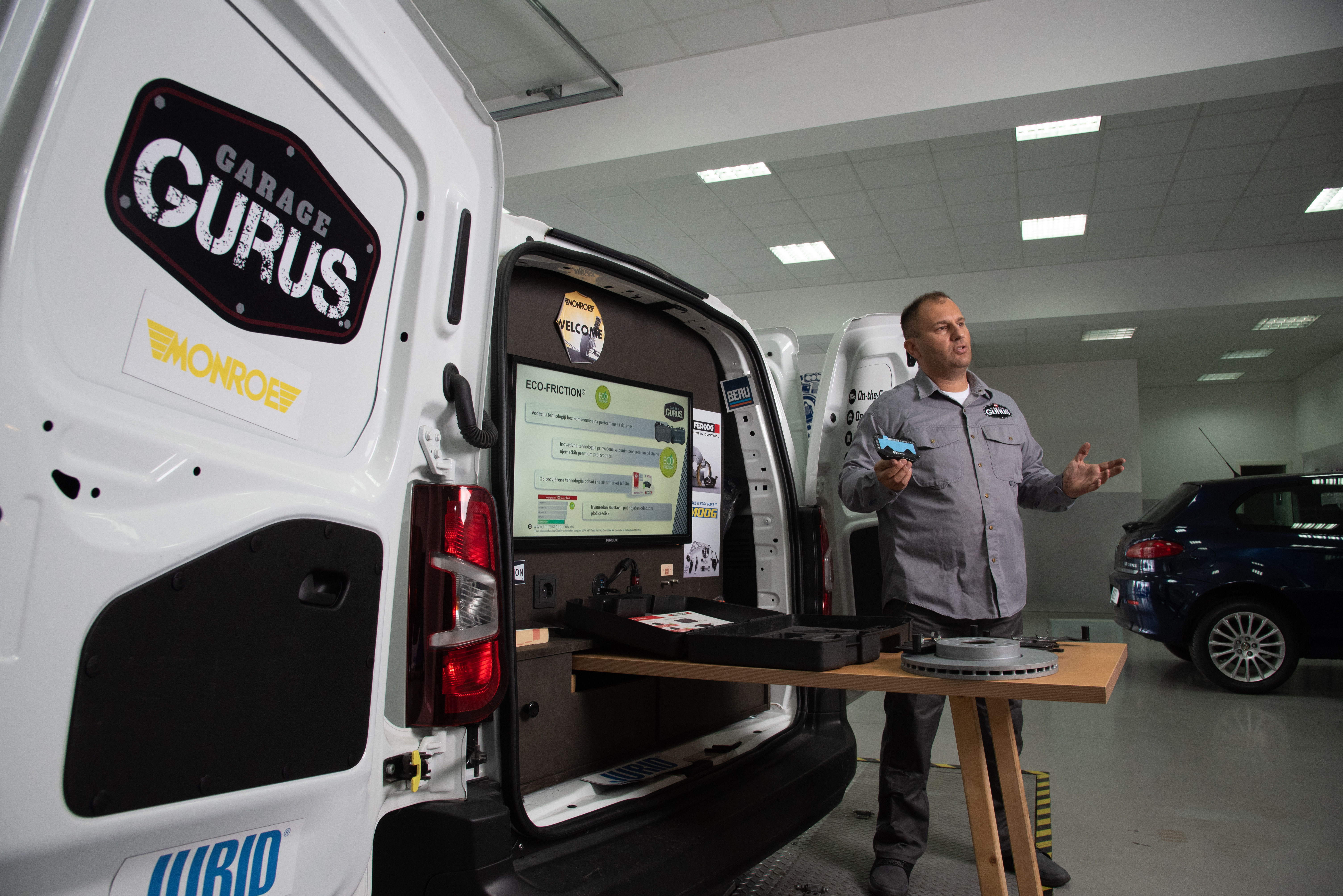 Garage Gurus On-The-Go offering a training at a garage