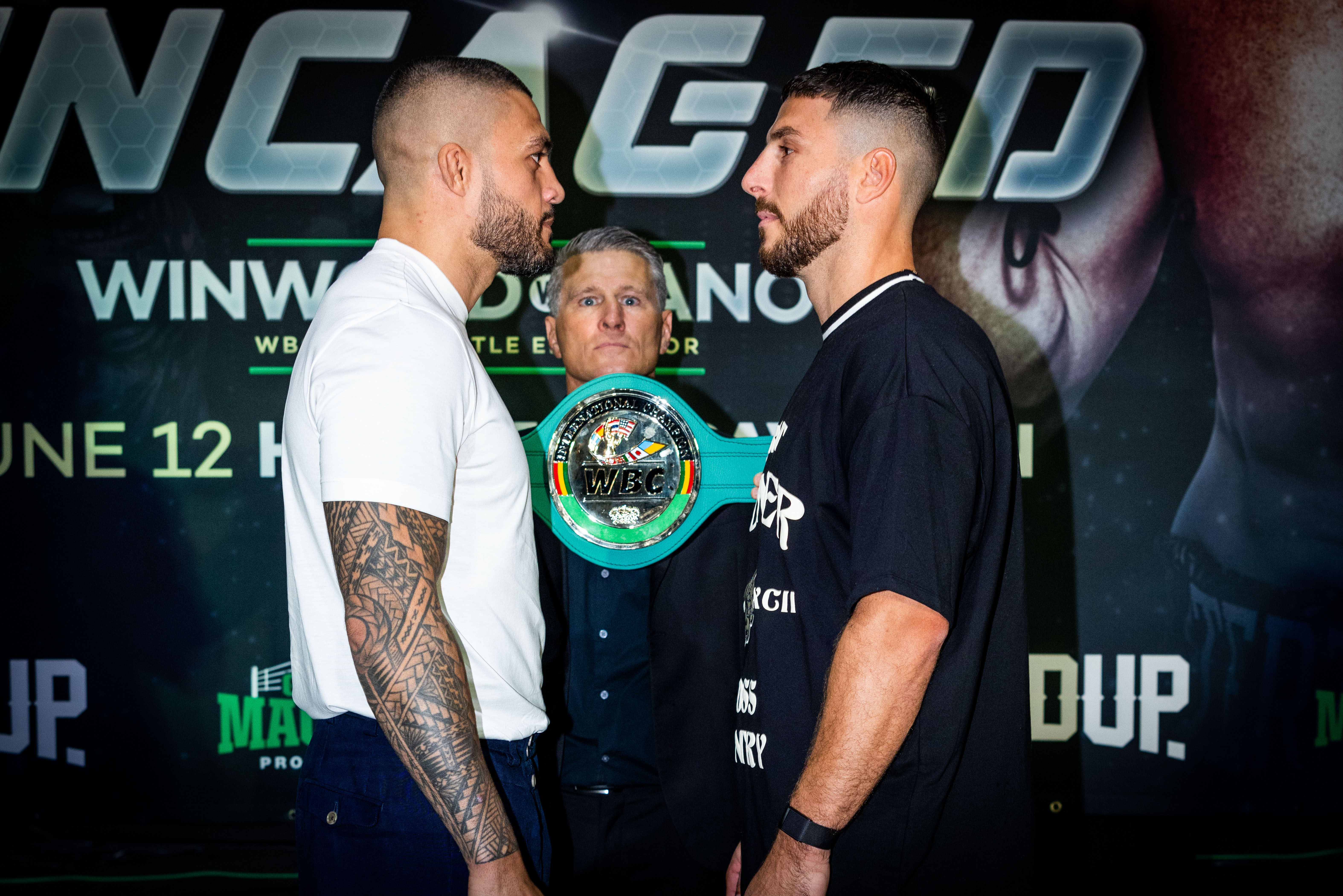 Tyson Pedro (L) and Kris Terzievski (R) face off, as Danny Green watches on.