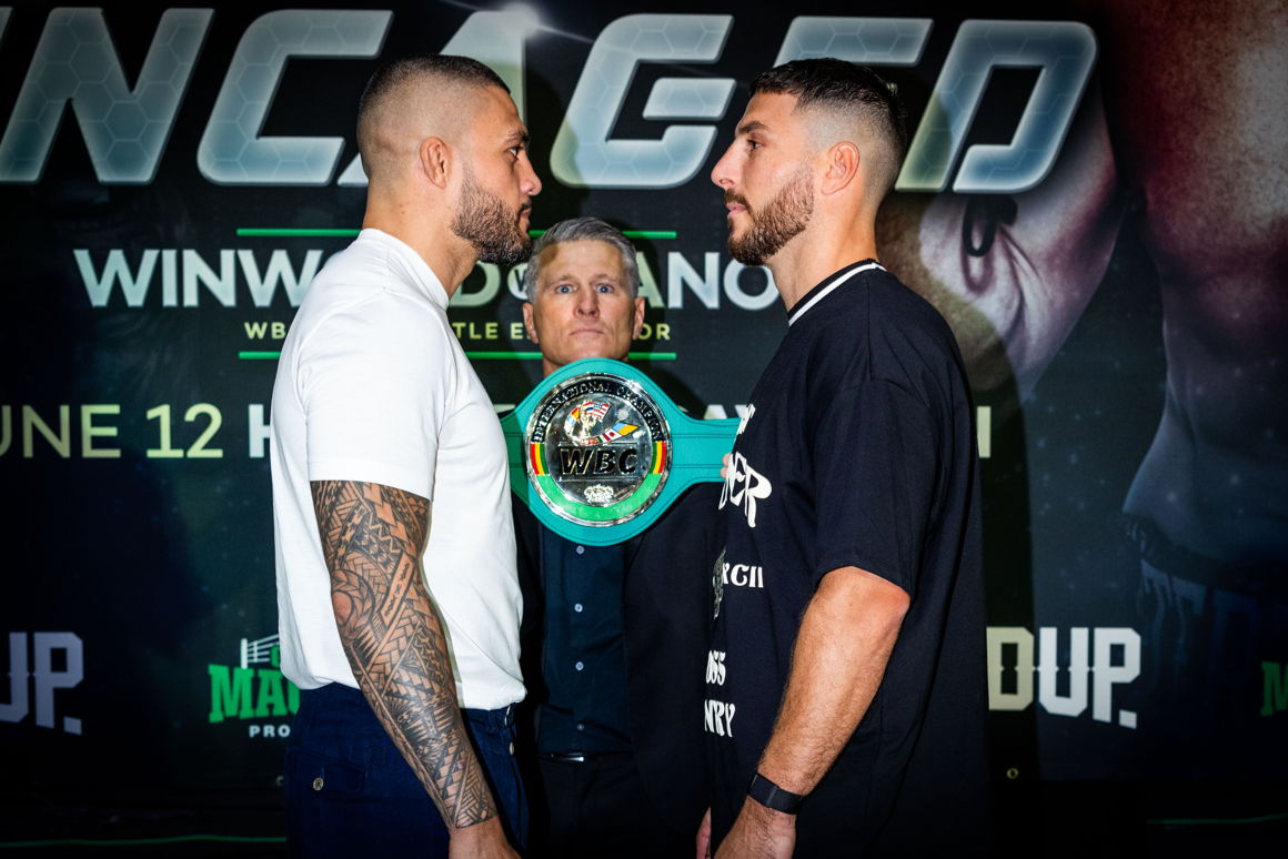 Tyson Pedro (L) and Kris Terzievski (R) face off, as Danny Green watches on.580x387