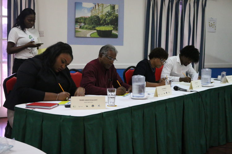 Panel of judges deliberate following the Pitch competition.