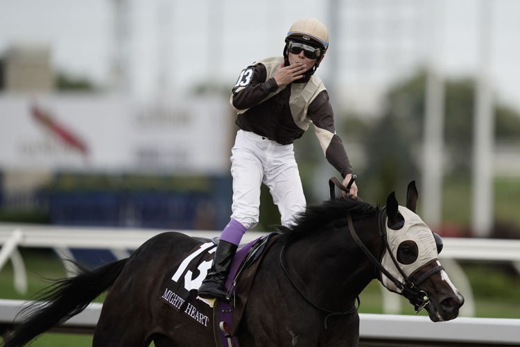Mighty Heart and jockey Daisuke Fukumoto winning The Queen's Plate in 2020 at Woodbine (Michael Burns Photo)