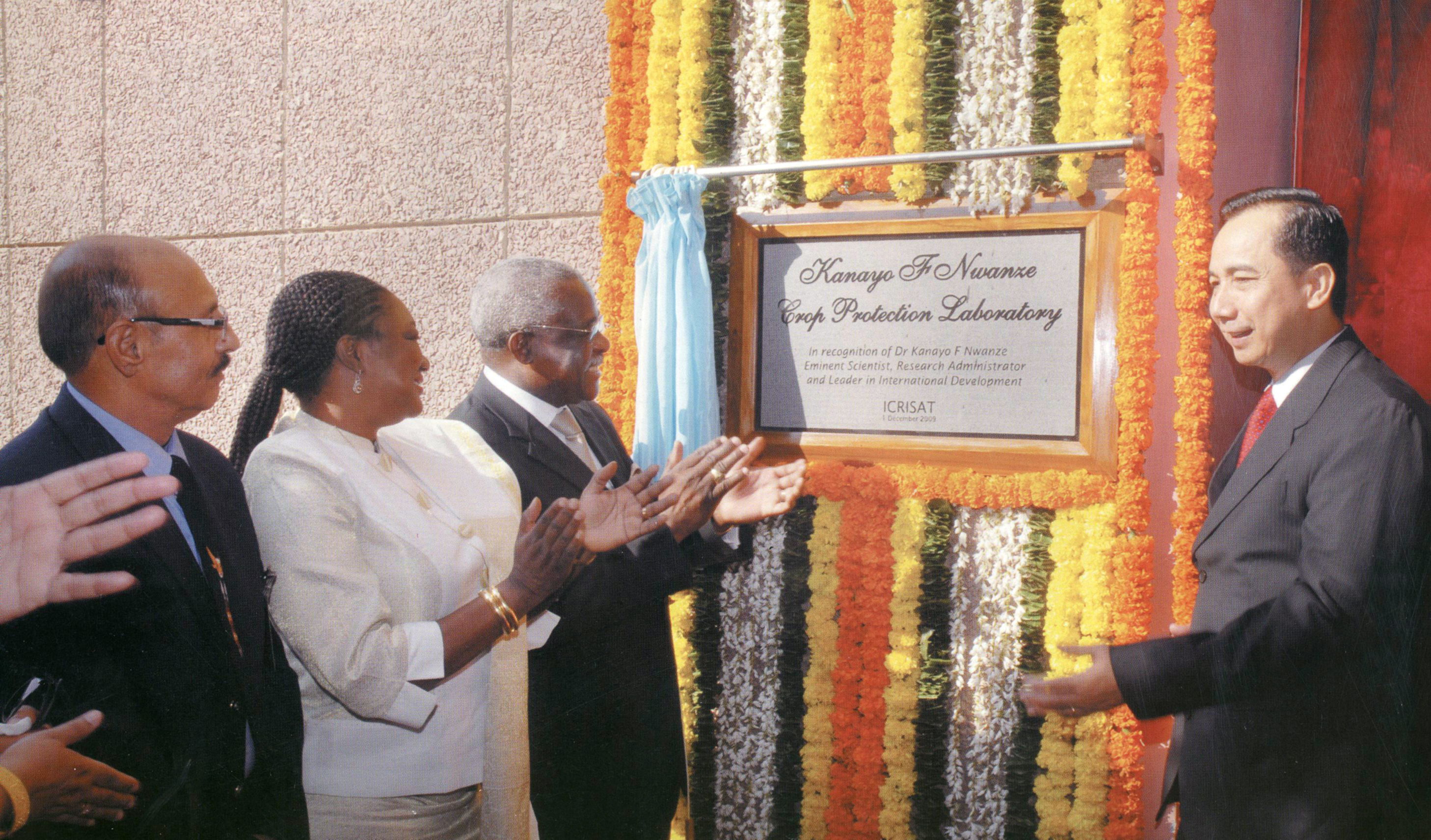 In remembrance of the late Dr Kanayo F. Nwanze, whose dedication to agricultural research and rural development has left an indelible legacy. Dr Nwanze (3rd from left) was present at the naming ceremony of ICRISAT's Crop Protection Laboratory, which was dedicated in his honor.