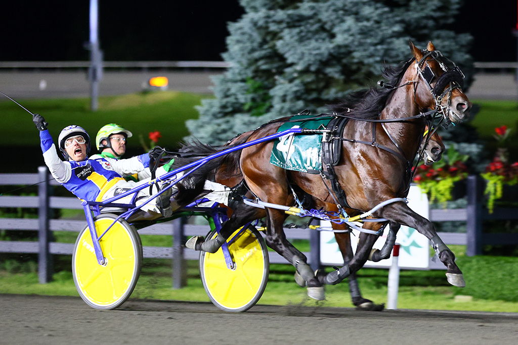 Nijinsky and driver Louis-Philippe Roy winning the 2024 Pepsi North America Cup. (New Image Media)