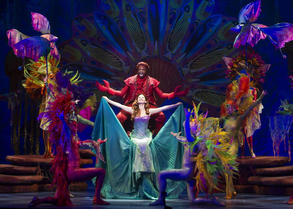 Melvin Abston as Sebastian, Alison Woods as Ariel and the cast of The Little Mermaid.  Photo by Bruce Bennett, courtesy of Theatre Under The Stars
