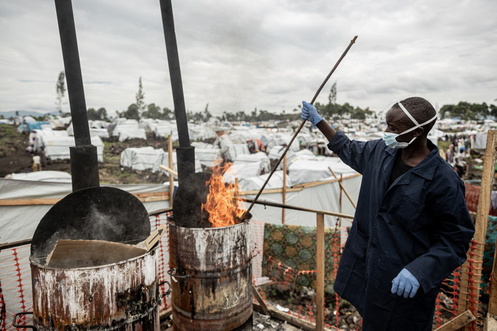 Title: Gilbert IZABAYO Copyright: Michel Lunanga/MSF Countries: Democratic Republic of Congo Date taken / Date Recorded: 16 March, 2023 Caption / Description: Gilbert IZABAYO, 30, is an IDP from Mweso. He fled to Bulengo because of the conflicts in his hometown. He did not want to stay in the camp waiting for help. After hearing on the radio that there were many people suffering from cholera in Bulengo, Gilbert wanted to do his part for other displaced people like himself. He now works as a hygienist. "I am doing this work with MSF to help others protect themselves from cholera, so that it doesn't spread in the camp and also so that we don't get sick while we are already living in such difficult conditions.