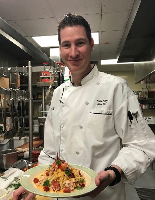 Sauteed Lobster Claw Meat in Roasted Red Pepper Sauce on a bed of Cherry Tomato Linguine