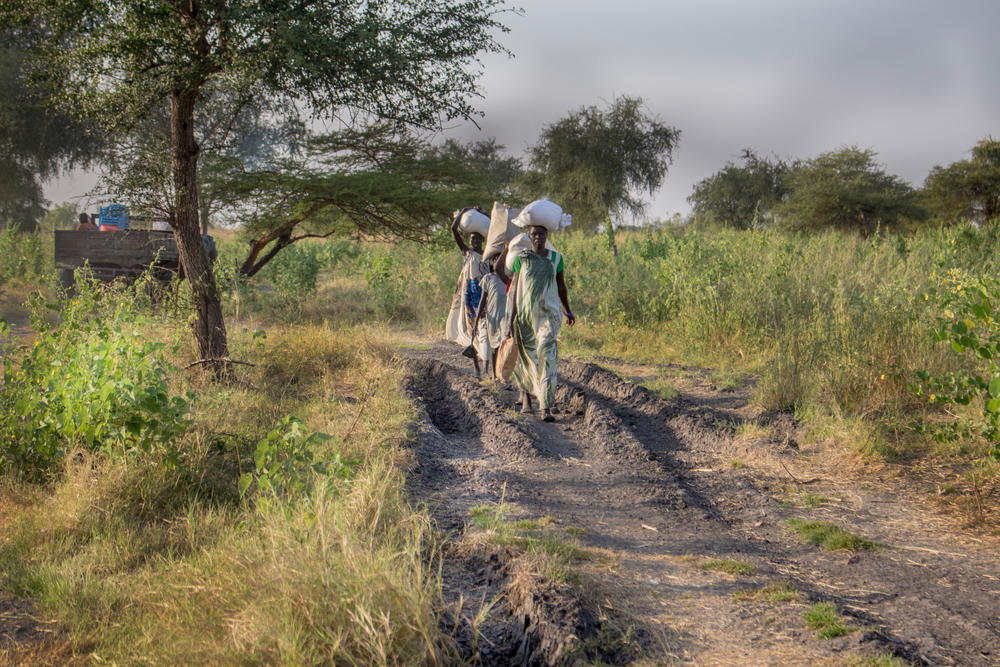 Leaving the village is difficult as people come to the mobile clinic in dribs and drabs. But by 3pm it is essential that the convoy leaves. For security reasons the team needs to be back in the base before nightfall.
The team tells the commuter elders that they will be back in a weeks time. Photographer: Philippe Carr/MSF