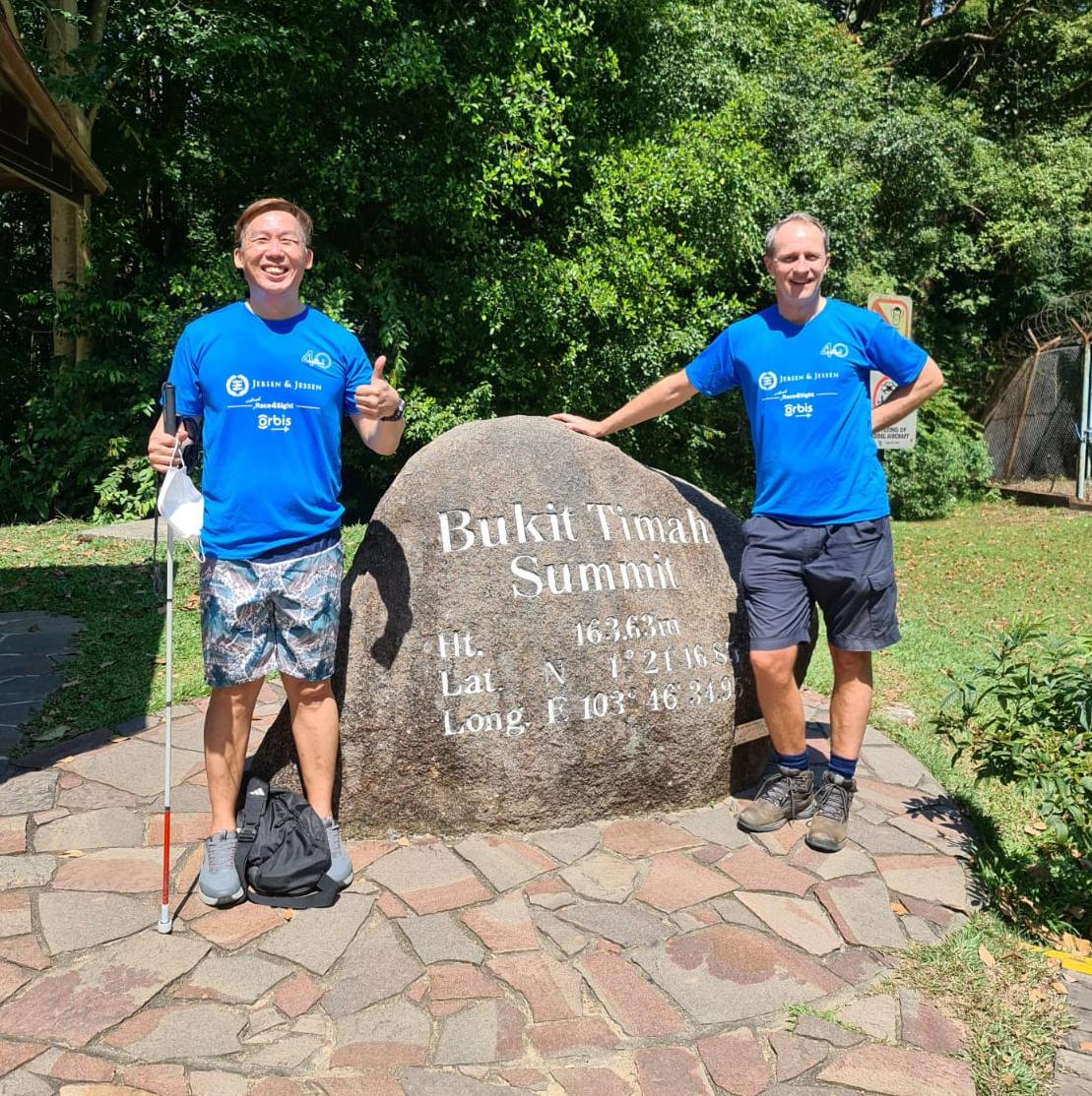 Heinrich Jessen and Orbis Ambassador Bernard Chew at the Singapore Bukit Timah Hill.