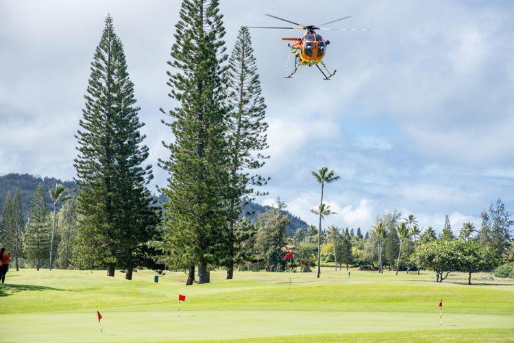 Paradise Helicopters drops golf calls for a raffle contest to start the tournament.