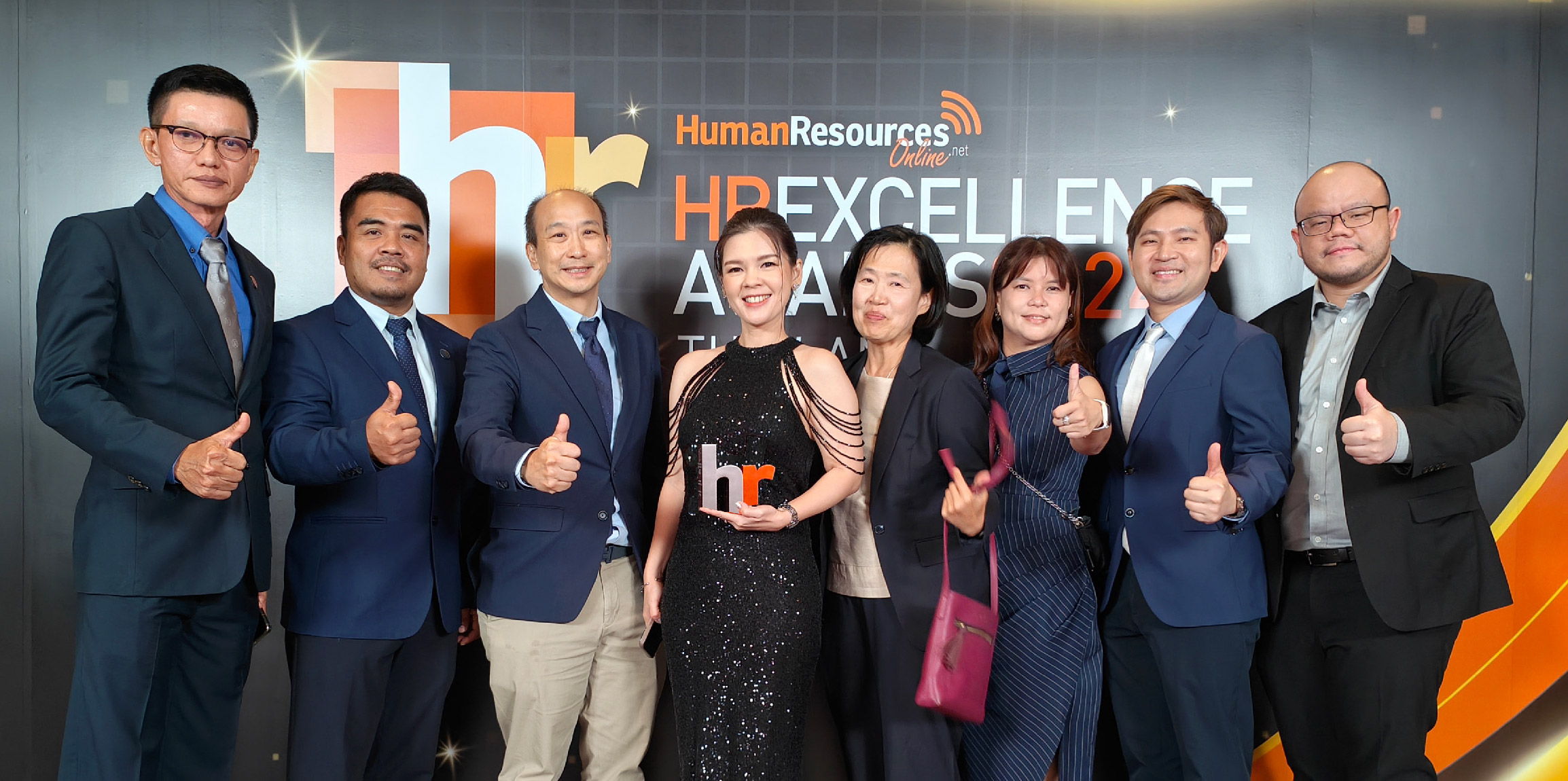 Jebsen & Jessen Ingredients Thailand team proudly displays their award.