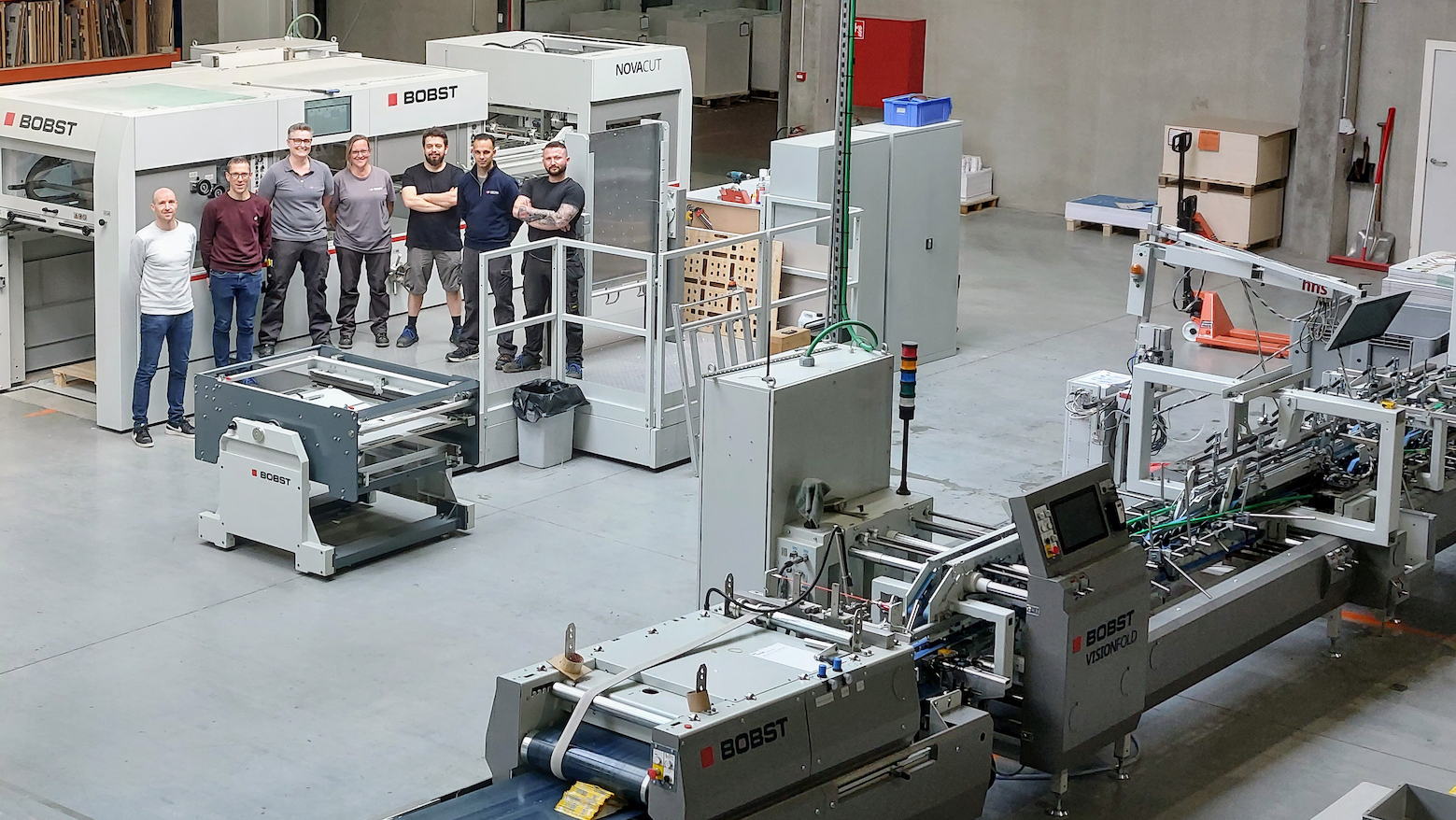 GEWA team in front of BOBST NOVACUT
