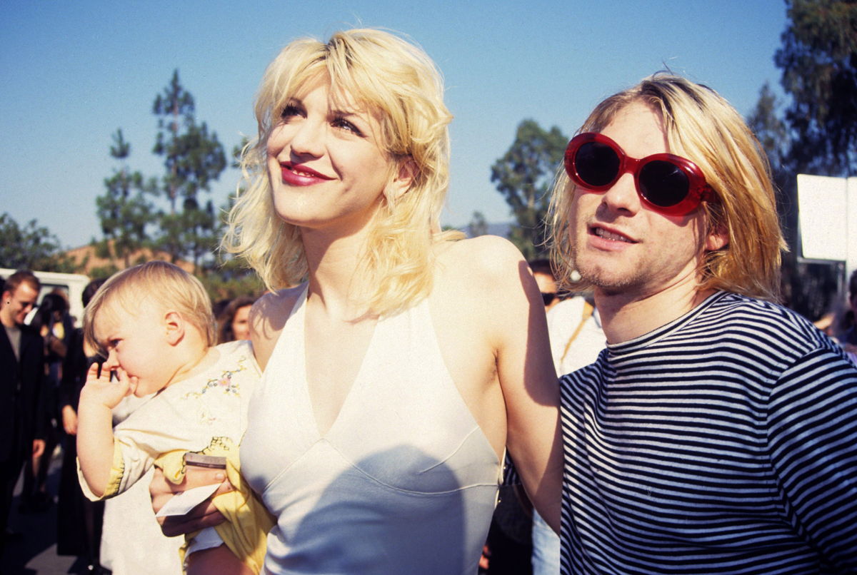 Kurt Cobain with his wife and other grunge icon Courtney Love and daughter Frances Bean Cobain