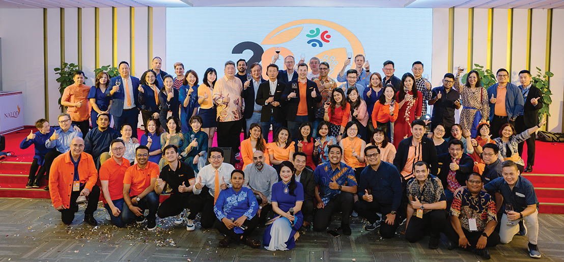 A group photo taken during the 20th anniversary gala dinner celebrations.