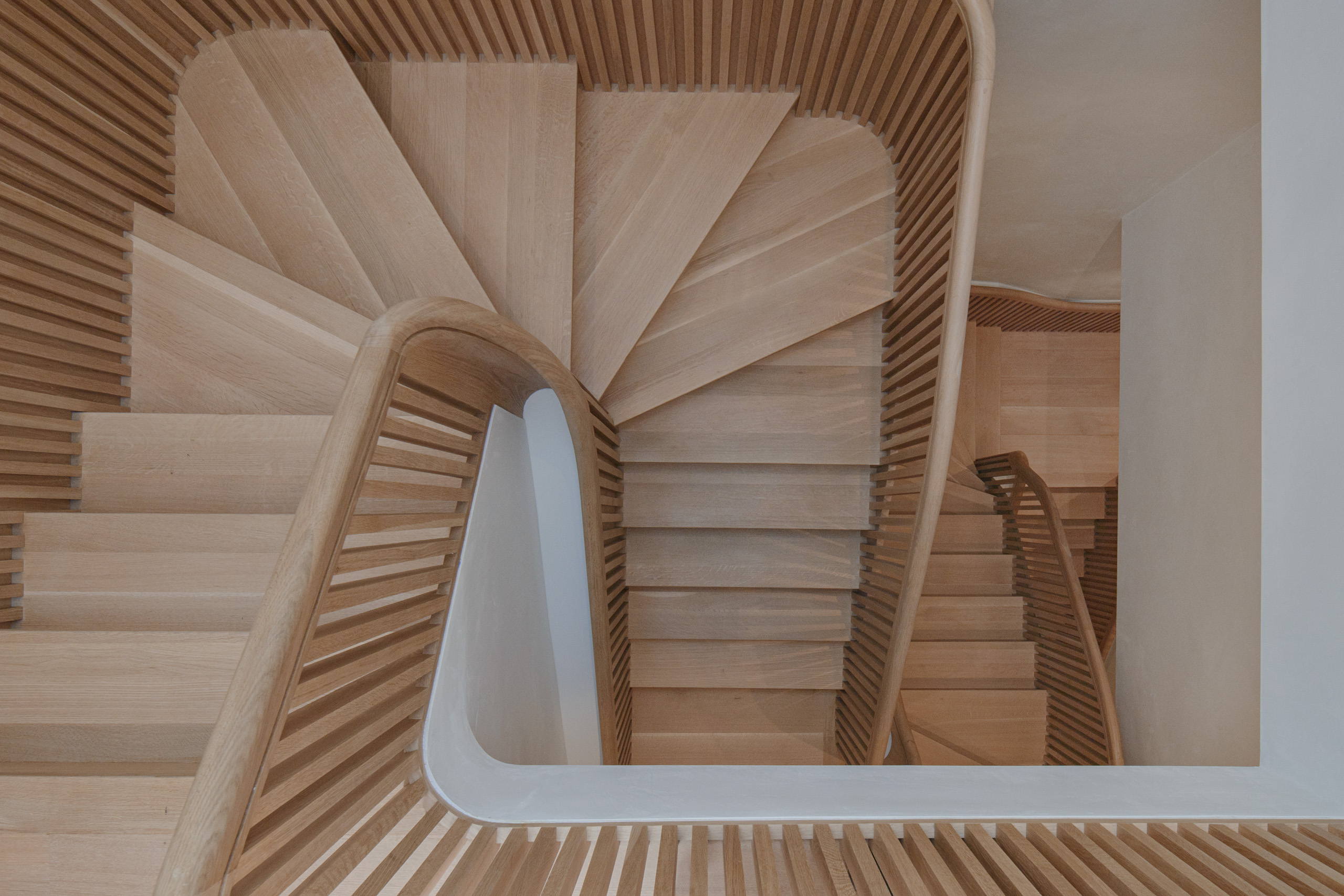 Studio J. Jih and Figure Transform Historic Boston Rowhouse With Sculptural, Cascading Staircase