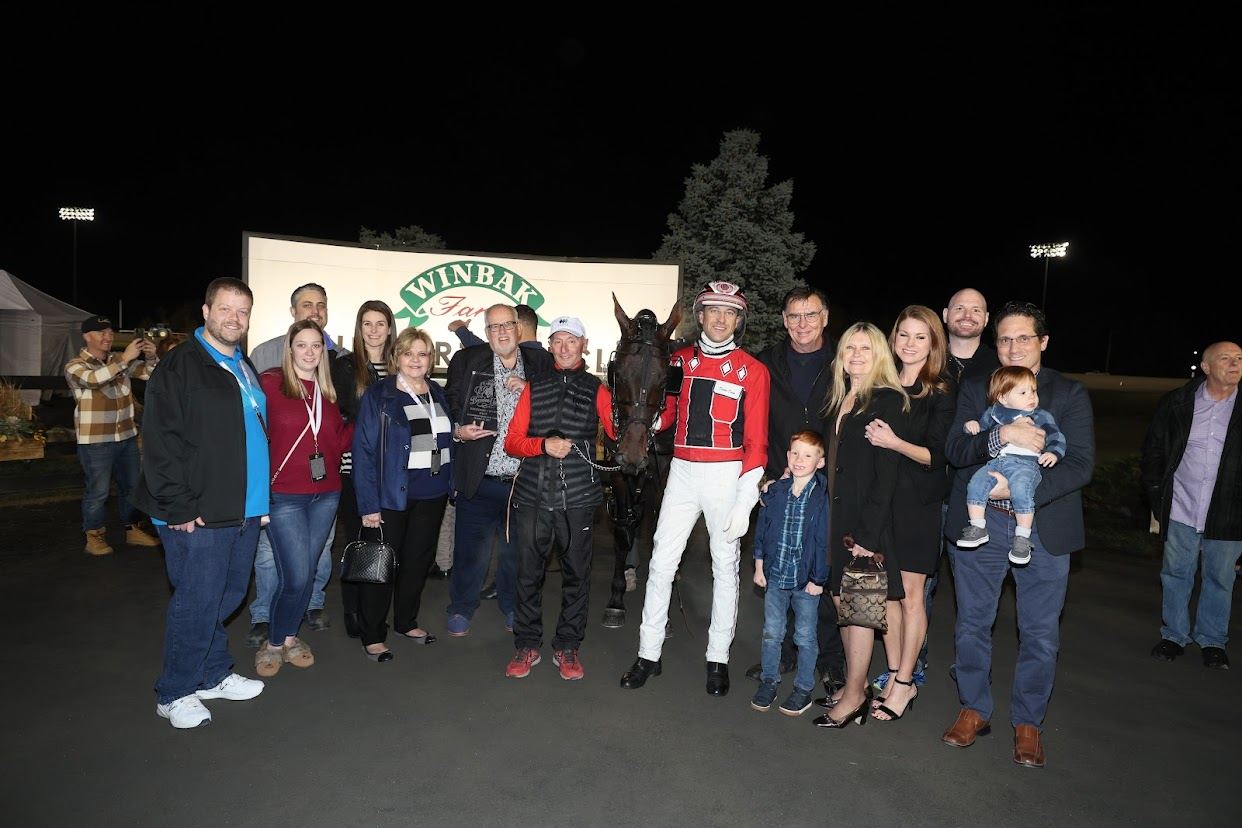 Connections of Bulldog Hanover after winning the Breeders Crown Open Pace final (New Image Media)
