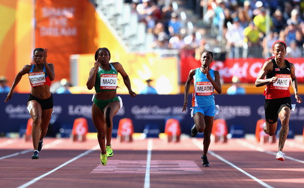 Rechelle competes in a 100 m event.