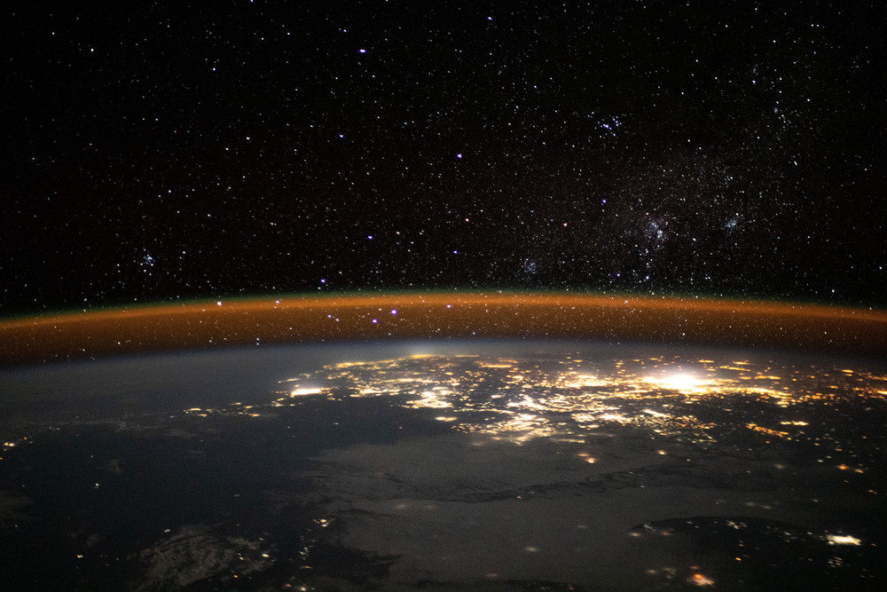 Earth's Atmosphere Over Africa, Satellite Image The glow of Earth's atmosphere blankets the southeastern coast of Africa as seen in this satellite image from the International Space Station, orbiting 263 miles above Earth on July 30, 2021. AKG9036439 ©akg-images / science source Earth's Atmosphere Over Africa, Satellite Image The glow of Earth's atmosphere blankets the southeastern coast of Africa as seen in this satellite image from the International Space Station, orbiting 263 miles above Earth on July 30, 2021. AKG9036439 ©akg-images / science source