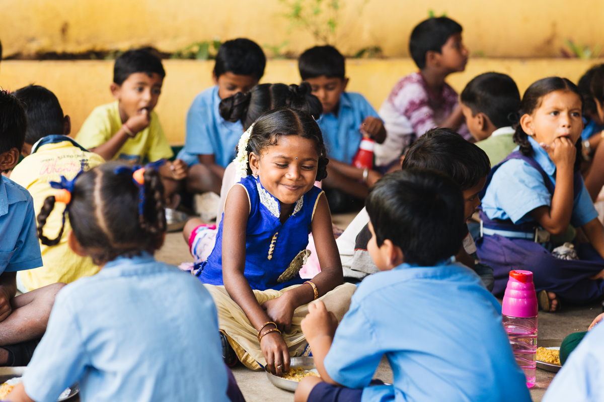 File photo of school children enjoying a mid-day millet meal in India.