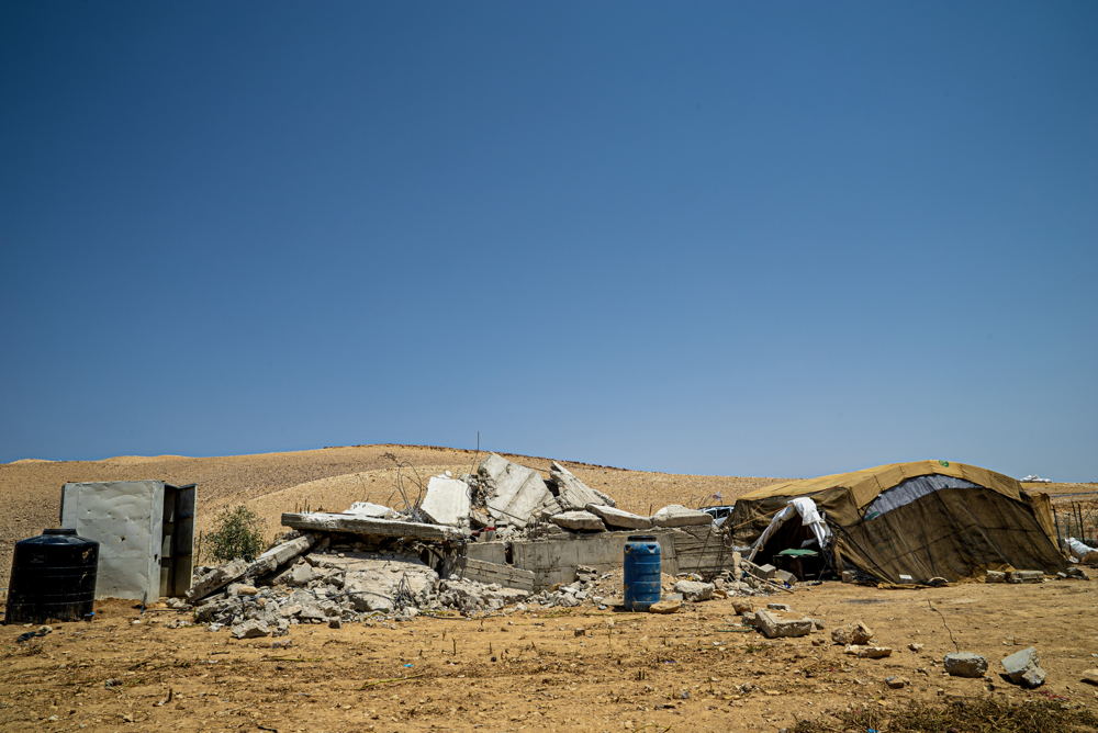Masafer Yatta is a desert region of the southern West Bank that is home to 1,144 Palestinians living across 12 villages. Their lives changed drastically in the 1980s when the land on which their homes are built was declared to be a ‘closed military zone’ by the Israeli authorities. On 4 May 2022, the Israeli Supreme Court declared that there were no ‘legal barriers’ to the evictions. As a result of the decision, 211 Palestinian households (1144 people) are at immediate risk of forced evictions, arbitrary displacement, and forcible transfer. Copyright : Juan Carlos Tomasi/MSF Masafer Yatta is a desert region of the southern West Bank that is home to 1,144 Palestinians living across 12 villages. Their lives changed drastically in the 1980s when the land on which their homes are built was declared to be a ‘closed military zone’ by the Israeli authorities. On 4 May 2022, the Israeli Supreme Court declared that there were no ‘legal barriers’ to the evictions. As a result of the decision, 211 Palestinian households (1144 people) are at immediate risk of forced evictions, arbitrary displacement, and forcible transfer. Copyright : Juan Carlos Tomasi/MSF