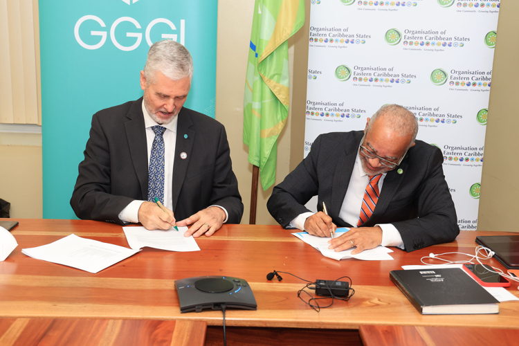 Dr. Rijsberman and Dr. Jules signing the Eastern Caribbean Regional Planning Framework