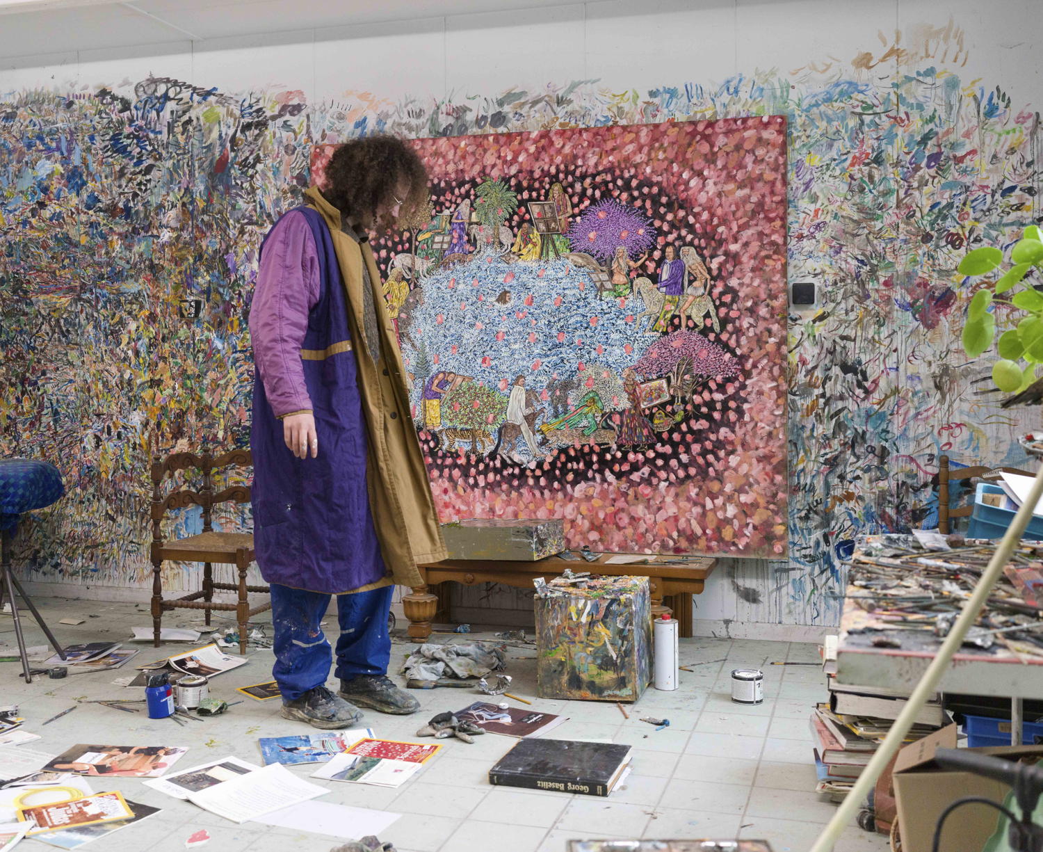 Bram Demunter in his studio in Kortrijk, Belgium. the painting on the background is Sparkling and Bubbling, 2024 oil on canvas 170 x 200 cm. Courtesy Tim Van Laere Gallery, Antwerp-Rome