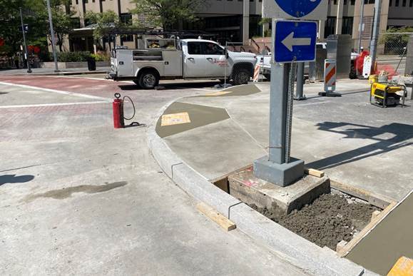 New accessible ramps recently placed at the corner Fifth Avenue and Ross Street