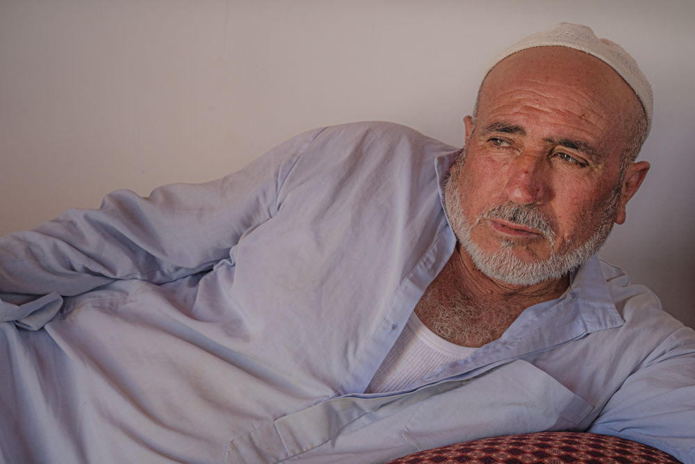 Mahmud, a resident of Al- Markez gathering, Masafer Yatta. He says: "My name is Mahmud Ali Najajreh. I was born here, and I live in this area. I have lived in this area since the day my mother gave birth to me in 1956. When the Occupation came in 1967, we stayed here. We got the first notices that our home was to be demolished in 2011. We appealed to the court through a lawyer. Copyright : Juan Carlos Tomasi/MSF