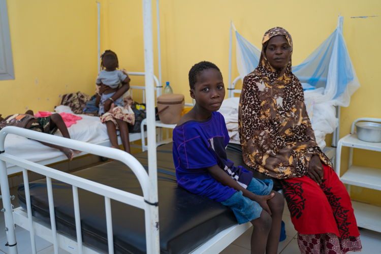 Little Tiefing Traoré, aged 9, had fallen off a donkey, fracturing his arm. "Ever since he fell, he had been complaining of pain in his arm," says his mother, Kadia Diarra. "We treated him at home using traditional methods. We waited several days hoping that he would get better. But the delay caused complications. Tiefing was treated at the Molodo community health centre and then referred to the Niono hospital, where we were told he would have to have his arm amputated. Over time, his hand and forearm had become gangrenous following a fracture of his humerus." Copyright: Mohamed Dayfour Diawara Little Tiefing Traoré, aged 9, had fallen off a donkey, fracturing his arm. "Ever since he fell, he had been complaining of pain in his arm," says his mother, Kadia Diarra. "We treated him at home using traditional methods. We waited several days hoping that he would get better. But the delay caused complications. Tiefing was treated at the Molodo community health centre and then referred to the Niono hospital, where we were told he would have to have his arm amputated. Over time, his hand and forearm had become gangrenous following a fracture of his humerus." Copyright: Mohamed Dayfour Diawara