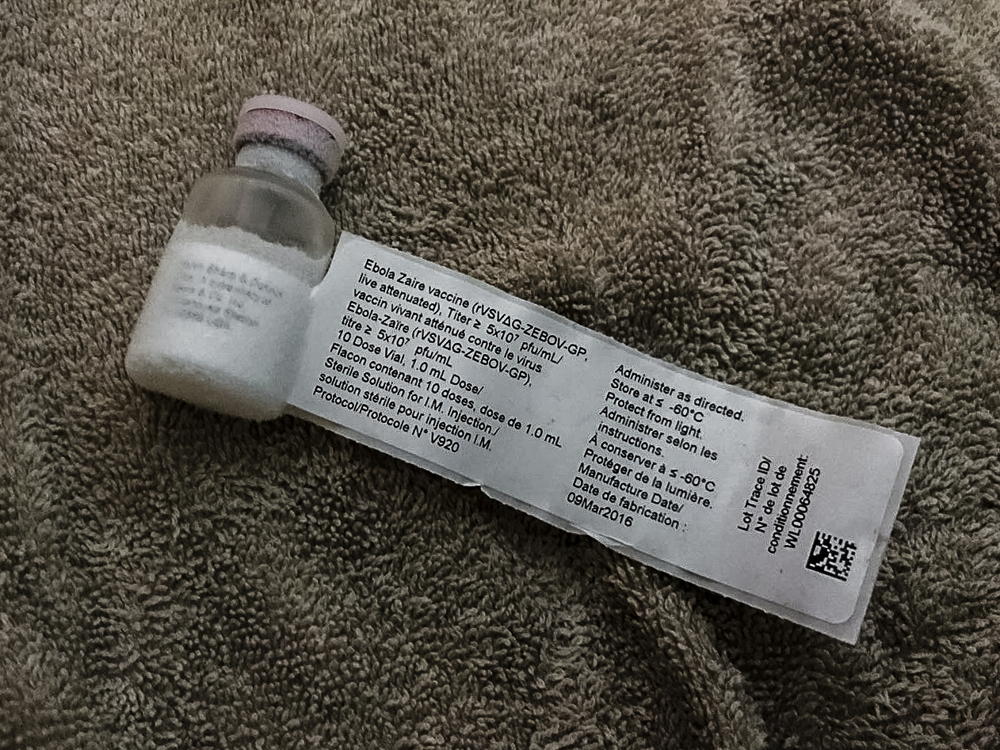 Close up of the Ebola Vaccine (rVSVDG-ZEBOV-GP) that is being used as part of the overall strategy to control the Ebola outbreak.
This investigational vaccine has not yet been licensed and is being implemented through a study protocol. Taken 28 May 2018, released 29 May 2018. Credit Louise Annaud/MSF Close up of the Ebola Vaccine (rVSVDG-ZEBOV-GP) that is being used as part of the overall strategy to control the Ebola outbreak.
This investigational vaccine has not yet been licensed and is being implemented through a study protocol. Taken 28 May 2018, released 29 May 2018. Credit Louise Annaud/MSF