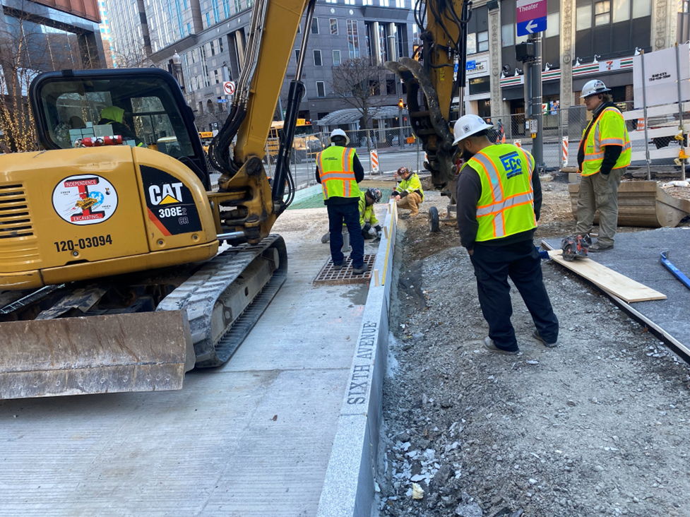 Granite curb installation at Wood Street Station