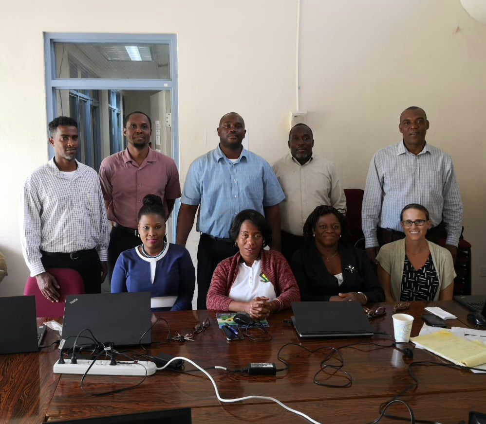 Participants and facilitators with Grenada's Permanent Secretary in the Ministry of Education, Mr. Kevin Andall (second from right).