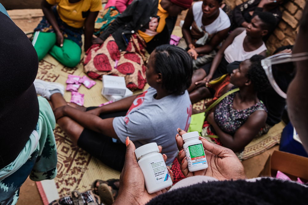 Jacqueline Zulu, MSF's health promotion officer, holds PREP and PEP medication before giving it to sex workers. MSF provides anti-HIV drugs to sex workers to prevent sexually transmitted diseases. Photographer: Diego Menjibar | Location: Malawi |Date:13/10/2023