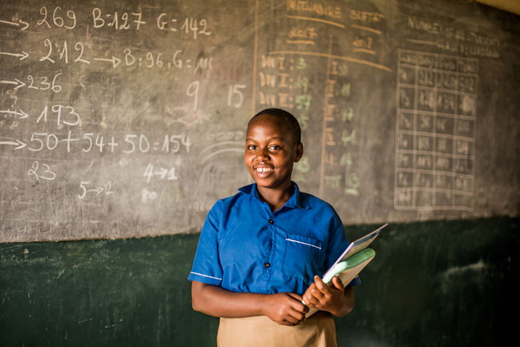 Olive, 16, in Rwanda, learns about sexual reproductive health rights at her youth club in her school ©Plan International
