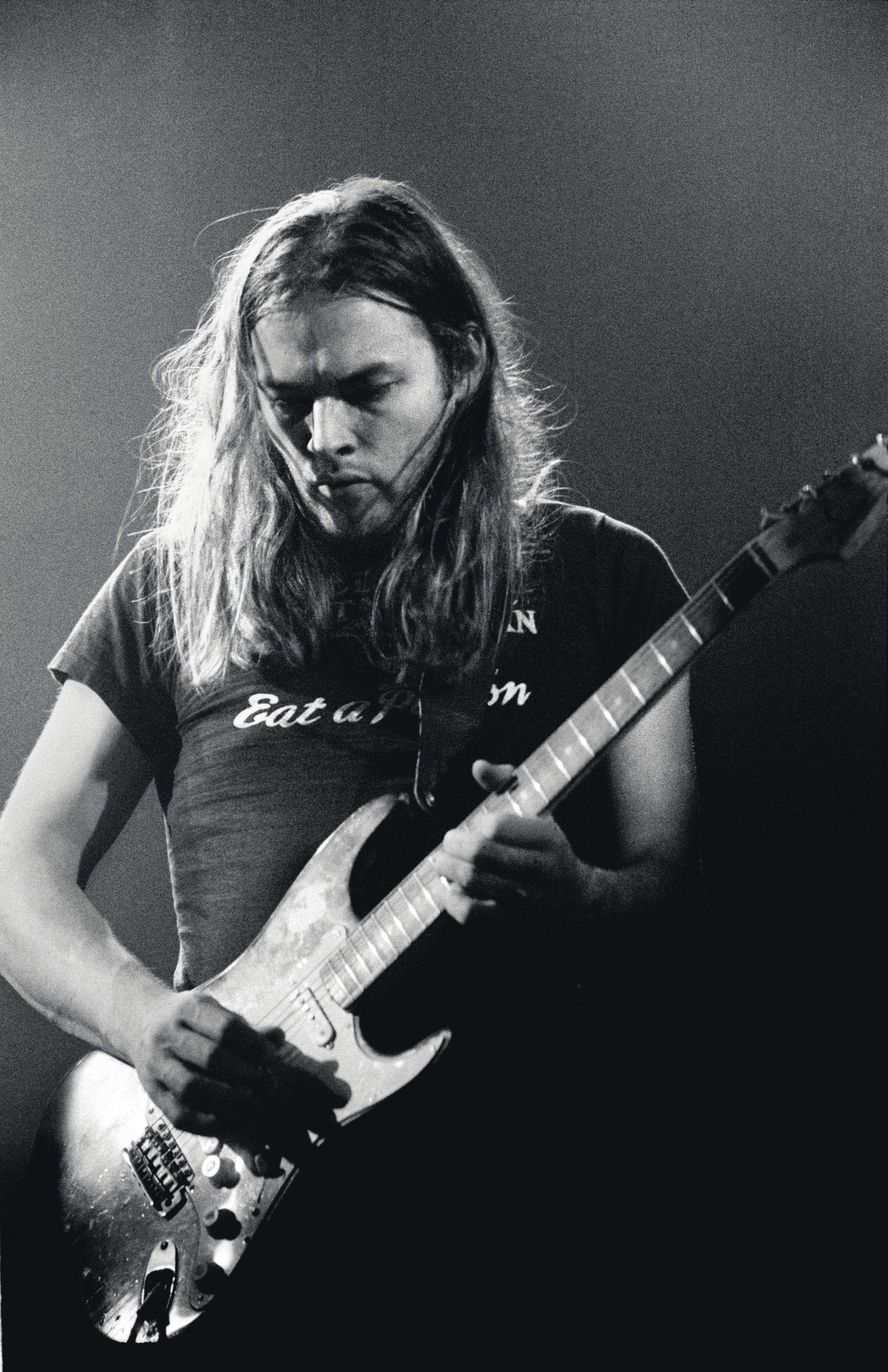 David Gilmour playing 'The Black Strat' with Pink Floyd, live at Earls Court, London, 19th May 1973.
Photo: Jill Fumanovsky