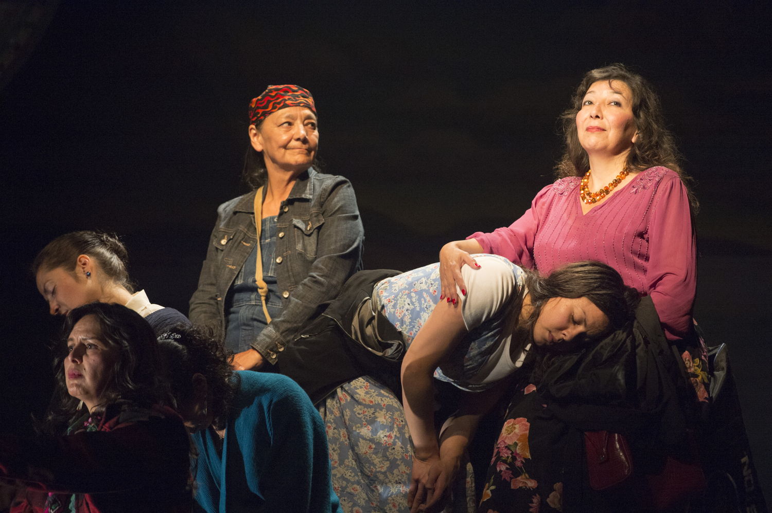 Left to right - Lisa C. Ravensbergen (as Annie Cook / in front), Cheri Maracle (as Veronique St. Pierre / back head down), Tantoo Cardinal (as Pelajia Patchnose), Tiffany Ayalik (as Zhaboonigan Peterson - head in lap), and Tracey Nepinak (as Philomena Moosetail)  in The Rez Sisters by Tomson Highway / Photos by David Cooper / <a href="http://www.belfry.bc.ca/the-rez-sisters/" rel="nofollow">www.belfry.bc.ca/the-rez-sisters/</a>