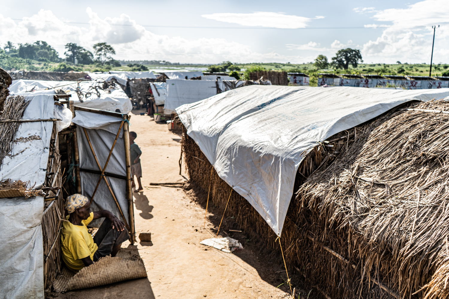 Cabo Delgado: 25 De Junho IDP camp
A man sits outside his shelter at the 25 de Junho camp for internally displaced people in Mozambique’s Cabo Delgado province which has seen armed conflict resulting in hundreds of thousands of people being displaced. Photographer: Tadeu Andre