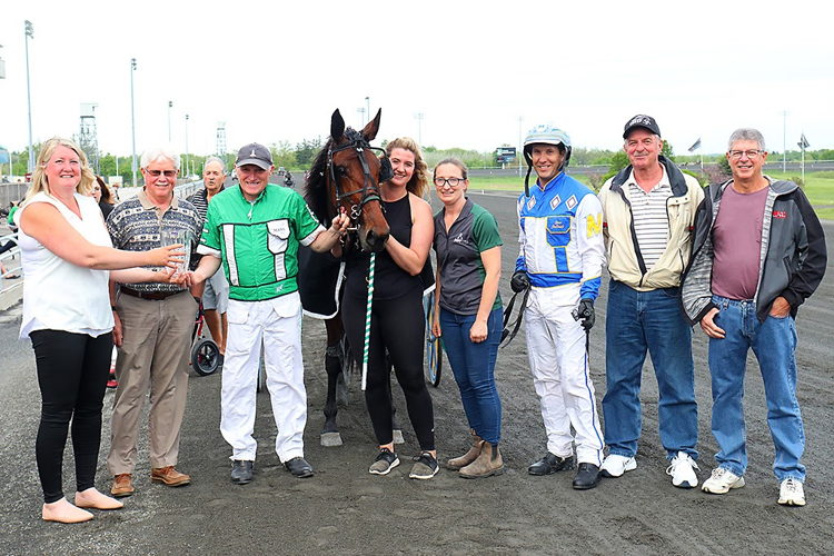 Trainer Mark Etsell (right of Adare Castle) and connections are all smiles after last Saturday's SBOA win. (New Image Media)