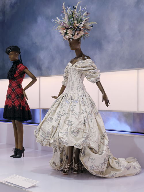 Installation view of Look 50, ballgown from The Widows of Culloden collection autumn winter 2006-07 on display in Alexander McQueen: Mind, Mythos, Muse at NGV International from 11 December 2022 - 16 April 2023. Headpieces by Michael Schmidt Photo: Tom Ross