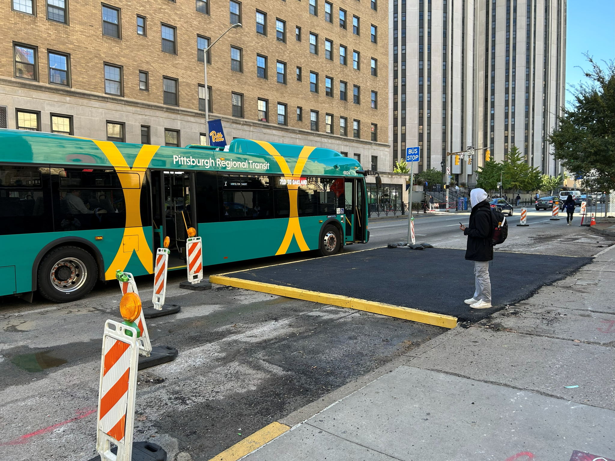 Temporary sidewalk extension recently placed on Fifth Avenue at University Place Temporary sidewalk extension recently placed on Fifth Avenue at University Place