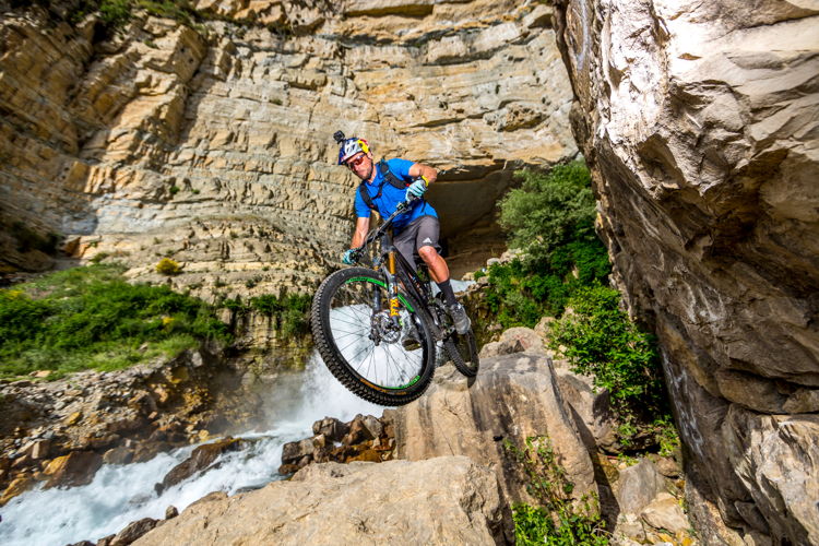 Christophe Akiki/Red Bull Content Pool -Kenny Belaey performs during filming Border to Border at Afqa waterfall, Lebanon